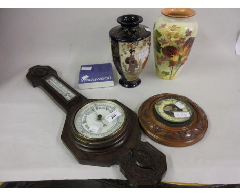 Oak aneroid barometer thermometer, a walnut aneroid barometer, two pottery vases and a Wedgwood dish in original box 