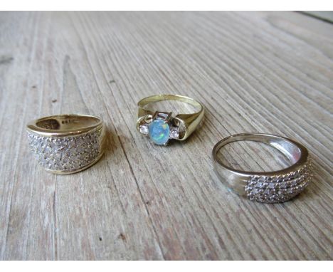 Three various diamond set dress rings, one set centre opal 