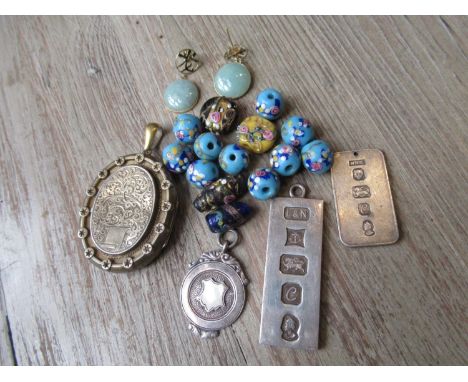 Pair of modern oriental 14ct gold and green jade earrings, a Victorian silver gilt locket, three silver medallions and a smal