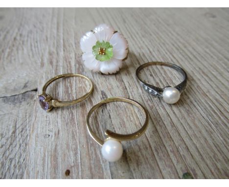 Four various 9ct gold dress rings, two set cultured pearl, one flower head and one set amethyst 