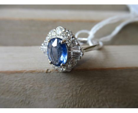 18ct White gold oval sapphire and diamond cluster ring, the sapphire approximately 2.09cts 