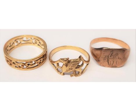 9ct Welsh Gold dragon design signet ring, another 9ct gold signet ring and a 9ct gold wedding band of pierced design10g appro