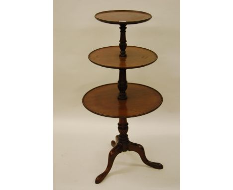 19th Century mahogany three tier graduated dumb waiter with turned wrythen column on tripod base 