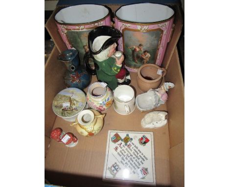 Pair of Paris porcelain vases decorated with figures on a pink ground (at fault), modern Royal Doulton Toby jug, small Poole 