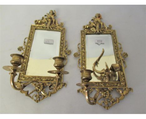 Pair of late 19th or early 20th Century brass two light wall scones with bevelled mirror inserts (one at fault)17ins high x 8