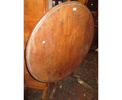 Victorian circular mahogany tilt top centre table on turned column and tripod support 