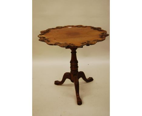 Reproduction circular carved mahogany bird cage pedestal table on tripod support, in George II style 