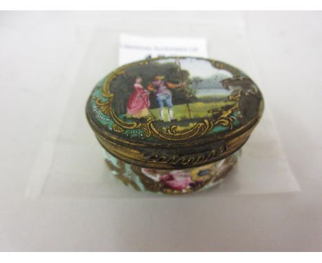 18th Century Continental enamel and gilt metal nutmeg grater, the hinged cover enclosing the pierced metal grating service (v
