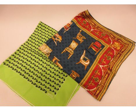 Two Gucci ladies silk scarvesSome staining as shown in photos to the green scarf.The green scarf has a Gucci sewn on label, b