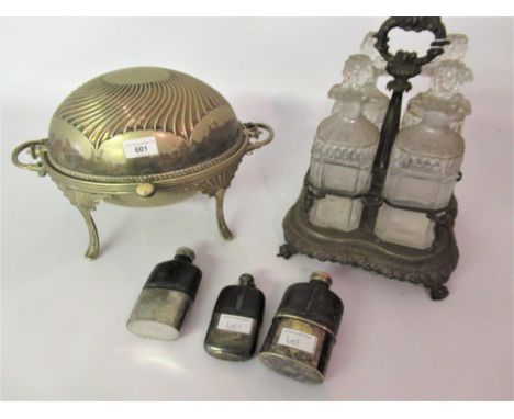 Late 19th or early 20th Century plated roll-over bacon dish, a 19th Century plated four bottle decanter stand with four decan