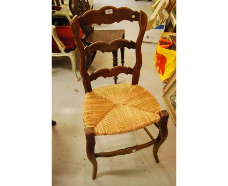 Set of six French oak ladder back chairs with rush seats 