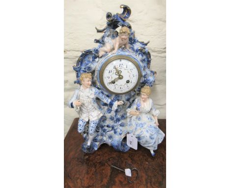 19th Century Sitzendorf blue, white and gilt decorated mantel clock, the enamel dial with Arabic numerals, painted floral dec