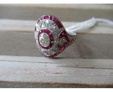 Platinum diamond and ruby ring with a filigree style mountThis is of recent manufacture - good condition ring size N 