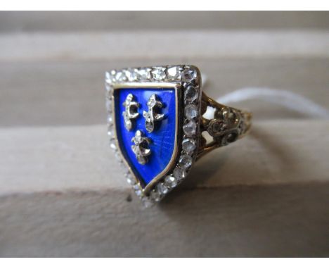 19th Century French yellow gold shield shape ring of fleur de lys design set diamond chips with blue enamel decorationLosses 