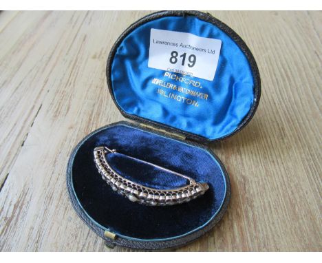 Victorian scarf clip of pierced design set split pearls, sapphires and diamond chipsDimensions are 60mm x 9mm 