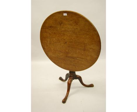 George III mahogany circular pedestal table, the tilt top above a plain turned column support and tripod, 31ins diameter (var