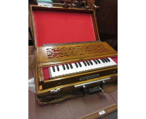 20th Century Indian harmonium with integral case 