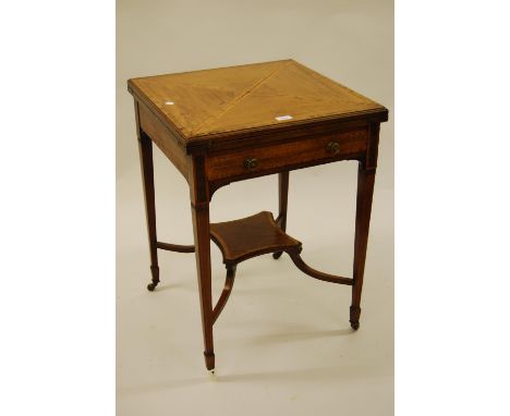 Edwardian mahogany and satinwood banded boxwood and ebony line inlaid envelope card table on square tapering supports with un