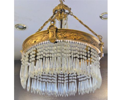 Pair of good quality early 20th Century gilt brass circular two tier light fittings with original chains and galleries, the c