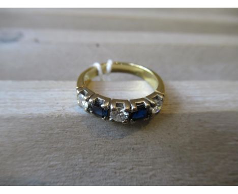 18ct Gold three stone diamond and two stone sapphire half eternity ring 