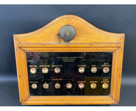 A good Edwardian oak cased country house scale servants alarm by Baily, Grundy &amp; Barrett, Cambridge, 25 3/4 x 21 1/2".