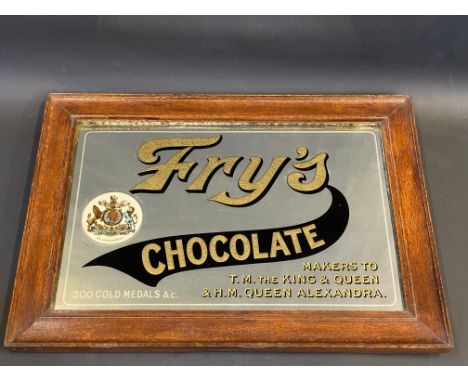 A Fry's Chocolate advertising mirror, in original stamped frame, 21 1/2 x 15 1/2".