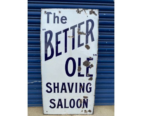 An unusual enamel sign advertising a shaving saloon with the words 'The Better Ole', a reference to Old Bill, 24 x 48".