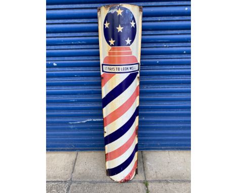 A barber's curved enamel sign depicting a barber pole, 10 x 48".