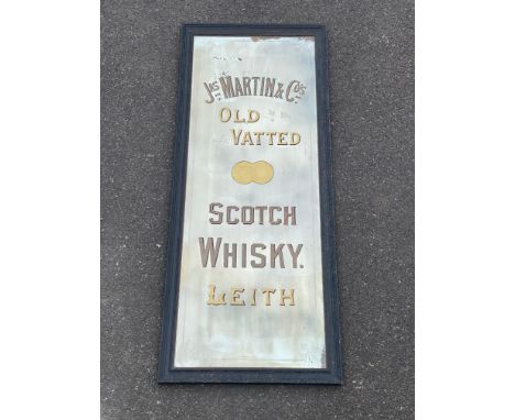 An early pub mirror advertising Jas Martin &amp; Co's Old Vated Scotch Whisky Leith, reframed, 22 1/2 x 54 1/2".