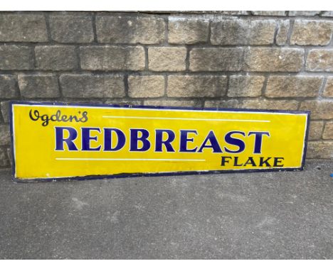 An Ogden's Redbreast Flake enamel sign, of tapering form, 74 1/2 x 20" at widest point.