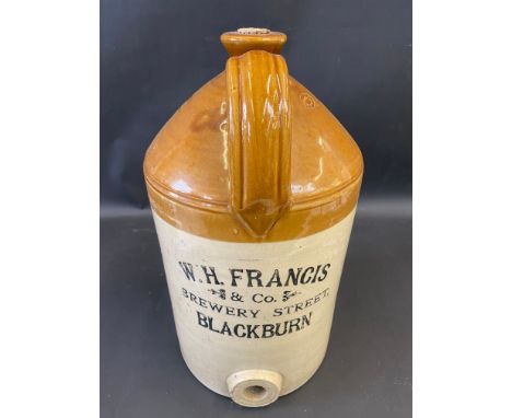 A large stoneware flagon for W.H.Francis &amp; Co. Brewery Street, Blackburn, 17 1/2" h.