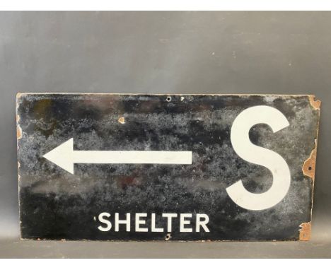 A war time double sided enamel sign directing people to an air raid shelter, by Chromo, 24 x 12".