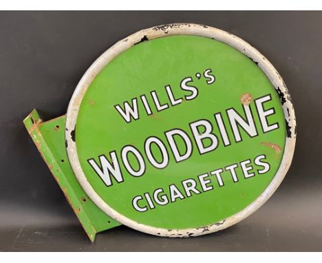 A Wills's Woodbine Cigarettes circular double sided enamel sign within an aluminium border with a mounting bracket, 18 3/4 x 