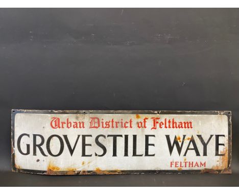 An Urban District of Feltham Grovestile Waye enamel street sign, 42 x 12".