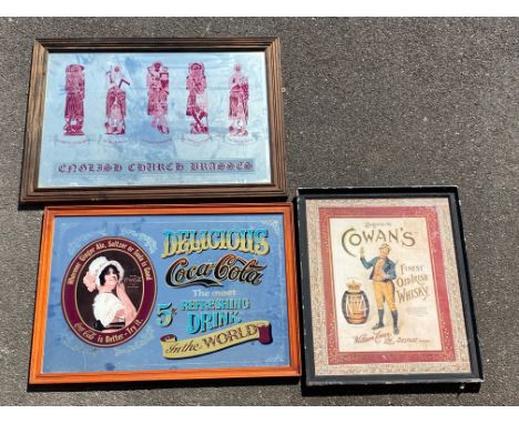 A reproduction Delicious Coca Cola advertising mirror, 33 x 23", a reproduction Cowan's Whisky advertisement 22 x 26", plus a