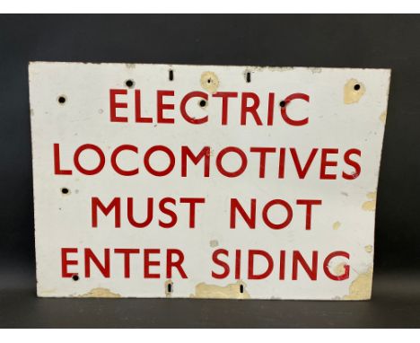 A rectangular enamel sign bearing the words 'Electric Locomotives Must Not Enter Siding', 28 x 19".