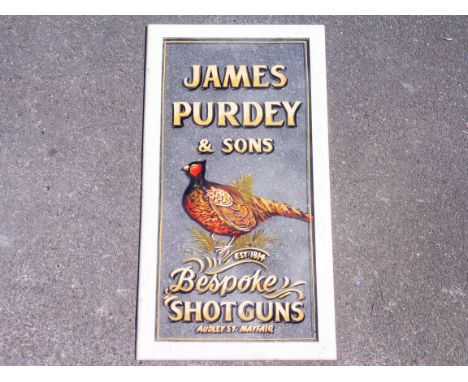 A wooden framed glass panel well painted to advertise James Purdey &amp; Sons, bespoke shotguns, 20 x 37".