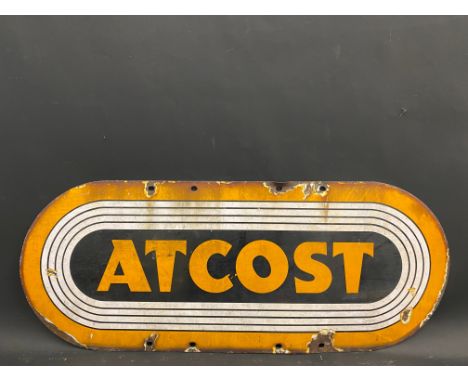 An Atcost enamel sign, 30 x 12".