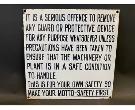 A small enamel sign warning 'safety first' when operating machinery, 12 x 12".