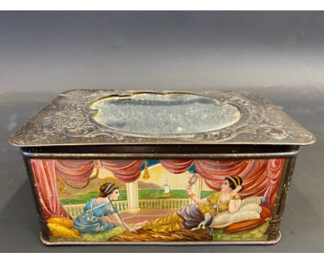 A Huntley and Palmers biscuit tin of Art Nouveau design, the mirrored lid lifting off to form an easel or travelling mirror, 