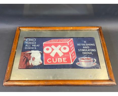 An OXO Cube pictorial advertising mirror, 19 1/2 x 13 1/2".