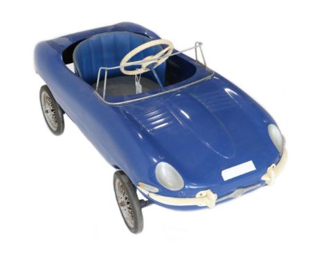 A Triang Vintage Pedal Car modelled as a Jaguar E-Type, painted blue, with tub shape leather seat, plastic steering wheel, me