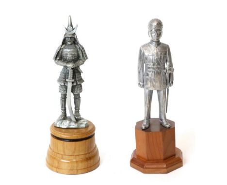 An Indian Maharajah's Palace Royal Guard Vintage Accessory Mascot, the uniformed guard with his sword, wearing a military pal
