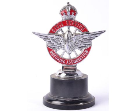 A Chrome and Enamel Civil Service Motoring Association Badge, mounted on a later black plastic base, 9cm high