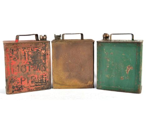 Three Vintage Petrol Fuel Cans, comprising a red painted Shell Motor Spirit example, a green painted example and a rusted She