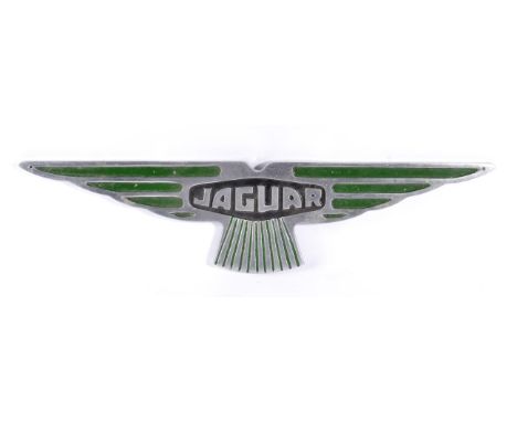 A Vintage Jaguar Chromed and Green Painted Showroom Sign, with two drill holes, 63cm diameter