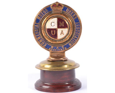 A Brass and Enamel Commercial Motor Users Associate RAC Associate Car Mascot, numbered 21200, mounted on a brass cap and late