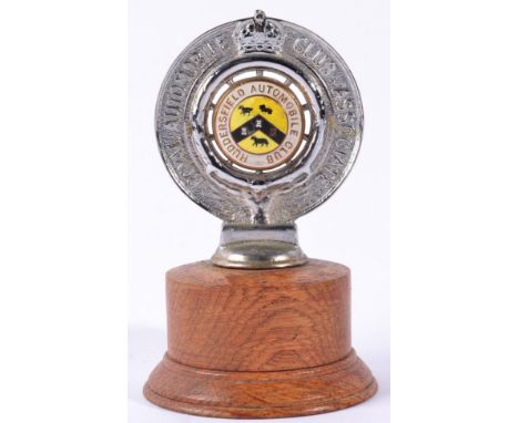 An RAC Association Chrome and Enamel Car Mascot, Huddersfield Automobile Club, mounted on a circular oak base, 9.5cm (some re