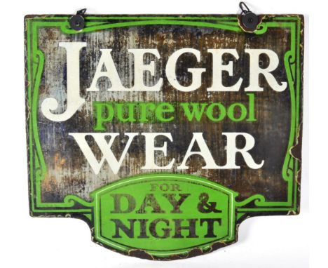 A Vintage Double-Sided Enamel Advertising Sign: JAEGAR PURE WOOL WEAR FOR DAY AND NIGHT, suspended by a modern metal chain, s