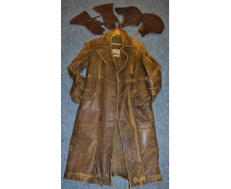A Vintage Brown Leather Motor Cycle Jacket, labelled The Majestic Leather Coat, heavily worn with split to shoulder; A Pair o